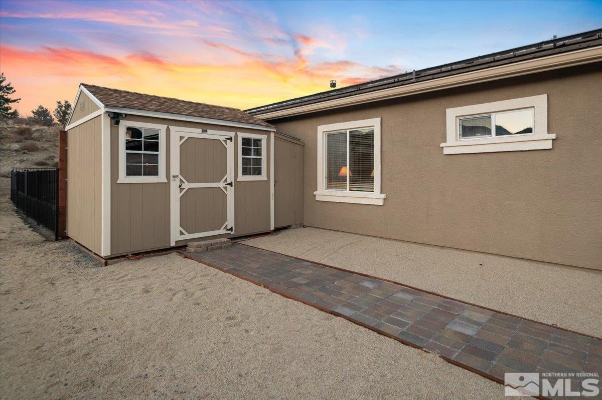 15185 Chateau Avenue Reno, NV 89511 - Photo 25 of 39 a view of a house with windows