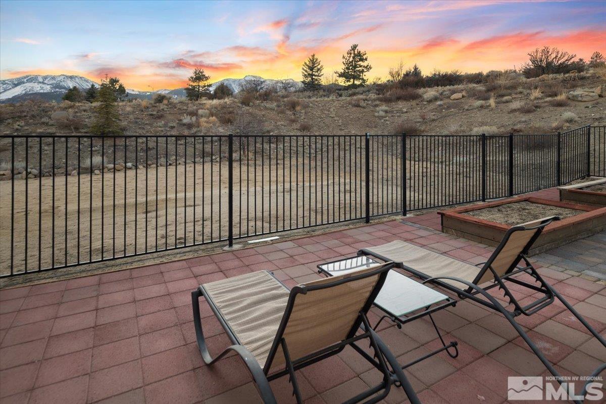 15185 Chateau Avenue Reno, NV 89511 - Photo 26 of 39 a view of a terrace with trees