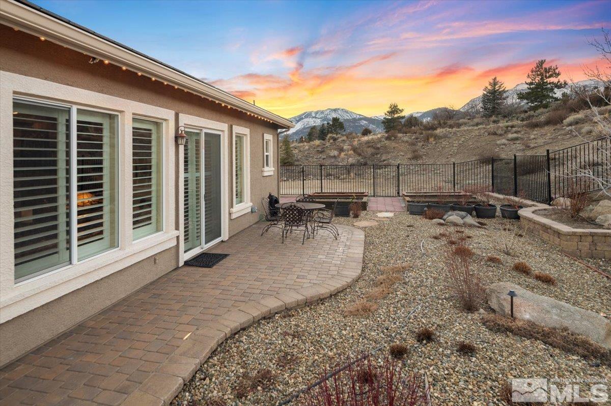 15185 Chateau Avenue Reno, NV 89511 - Photo 28 of 39 a view of a backyard with sitting area
