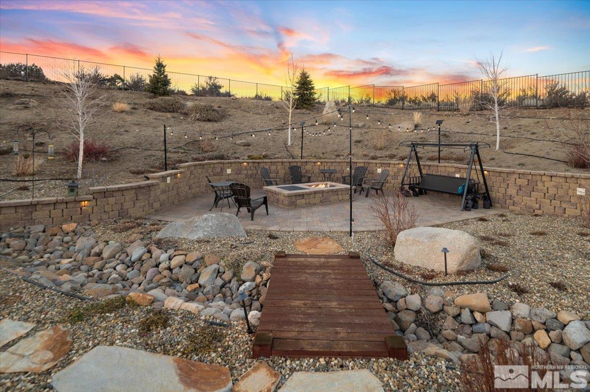 15185 Chateau Avenue Reno, NV 89511 - Photo 29 of 39 a view of a backyard with sitting area