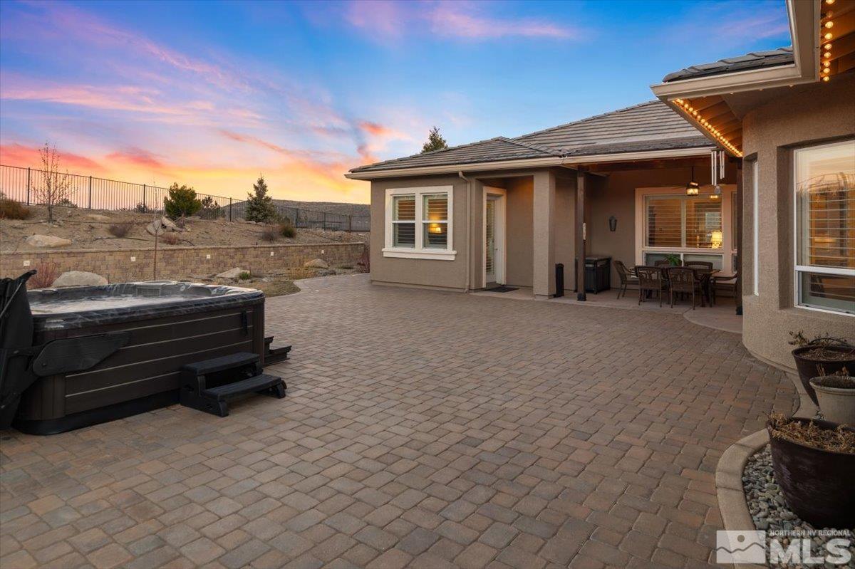 15185 Chateau Avenue Reno, NV 89511 - Photo 3 of 39 a view of a house with a yard and furniture