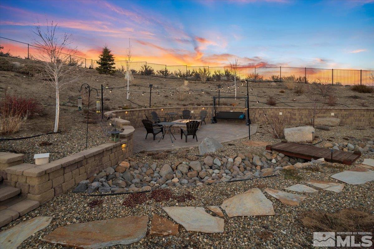 15185 Chateau Avenue Reno, NV 89511 - Photo 36 of 39 a view of a terrace with a bench