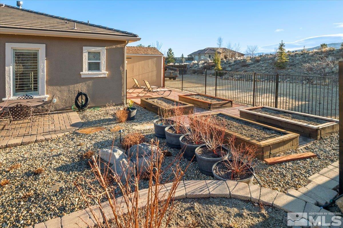15185 Chateau Avenue Reno, NV 89511 - Photo 37 of 39 a view of a chairs and table in the patio