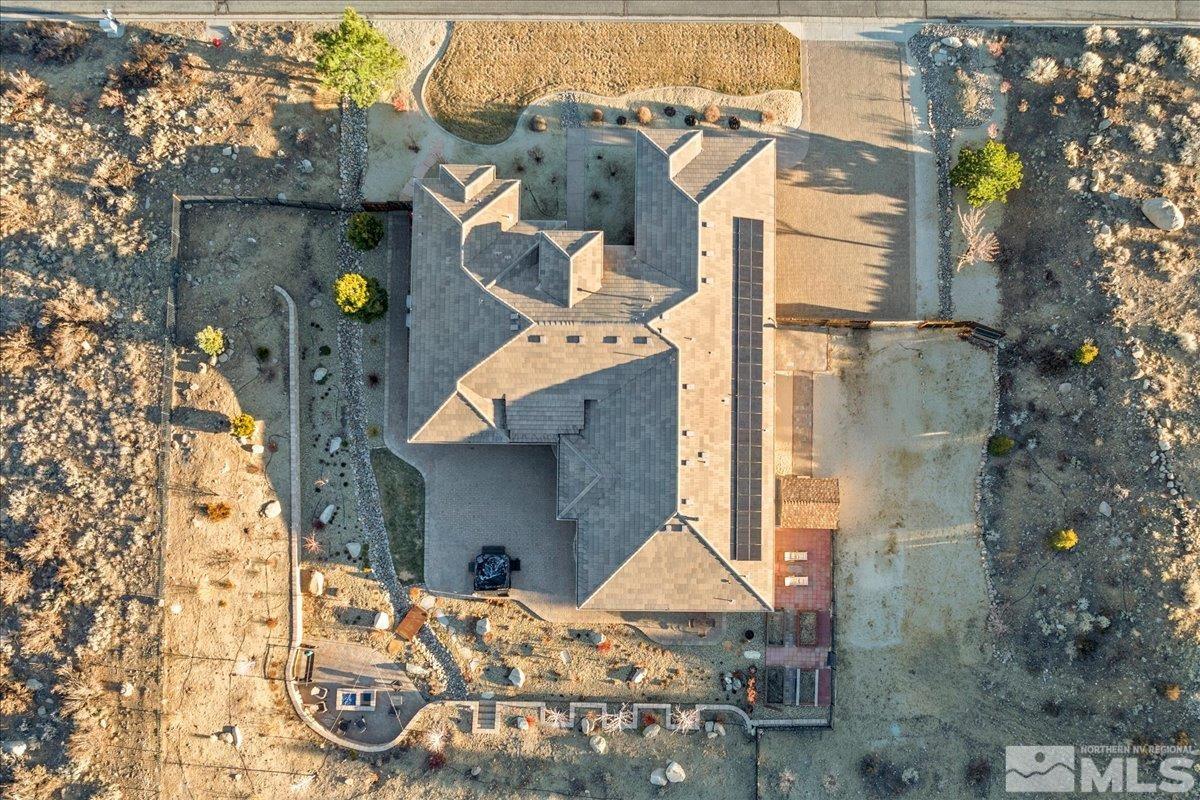 15185 Chateau Avenue Reno, NV 89511 - Photo 39 of 39 an aerial view of a house with table and chairs