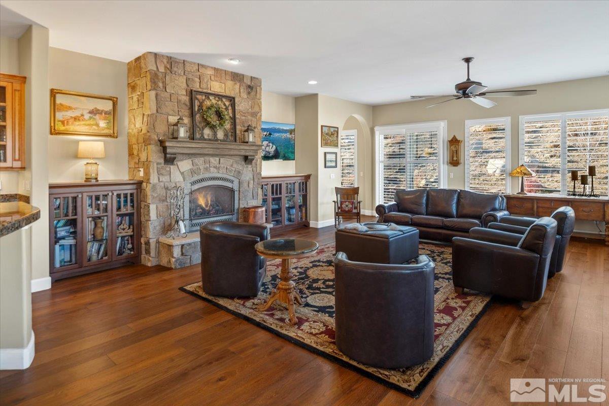 15185 Chateau Avenue Reno, NV 89511 - Photo 8 of 39 a living room with furniture and a fireplace