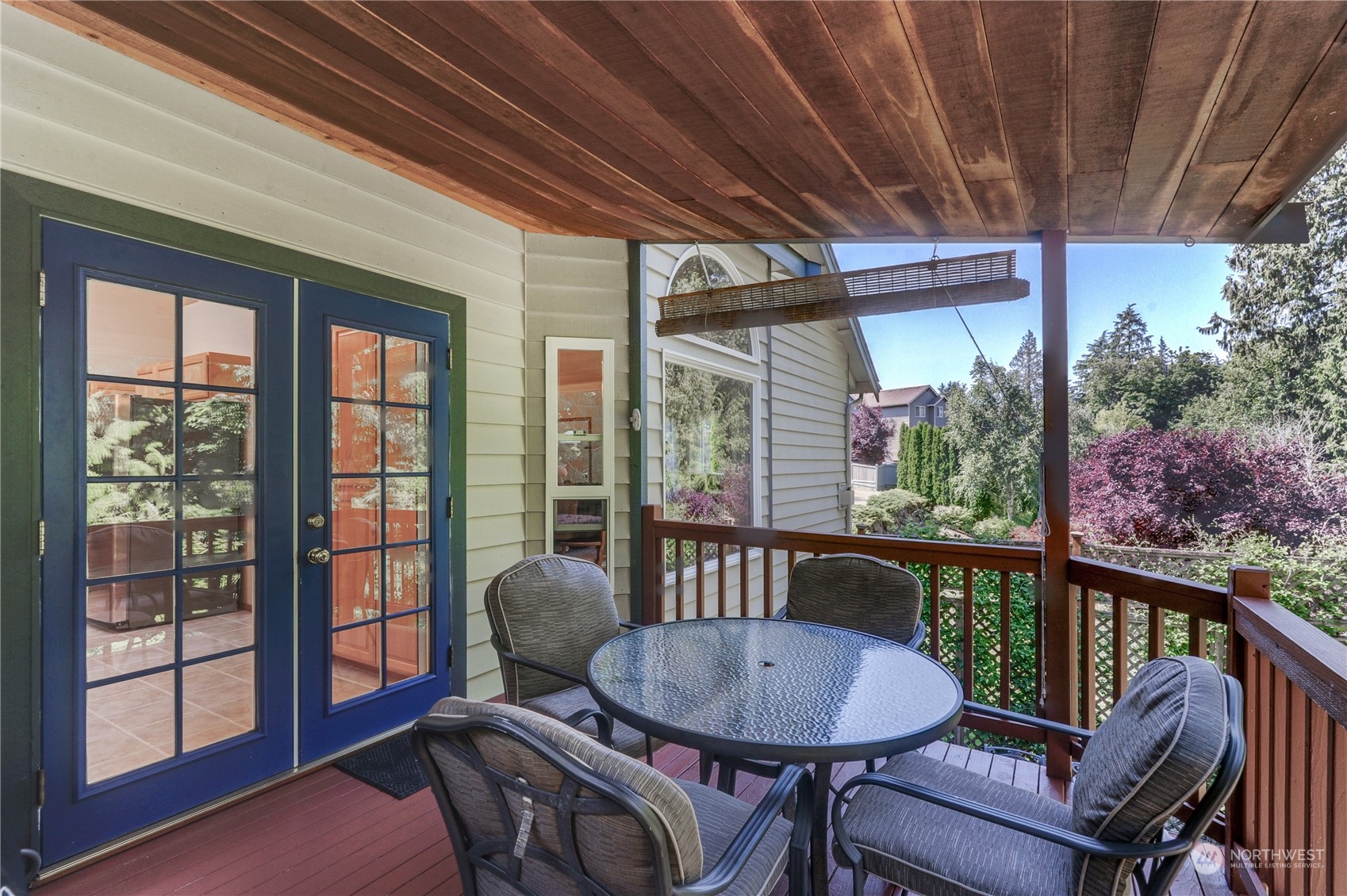 5303 Narbeck Avenue Everett, WA 98203 - Photo 12 of 40 a view of a porch with furniture and a backyard