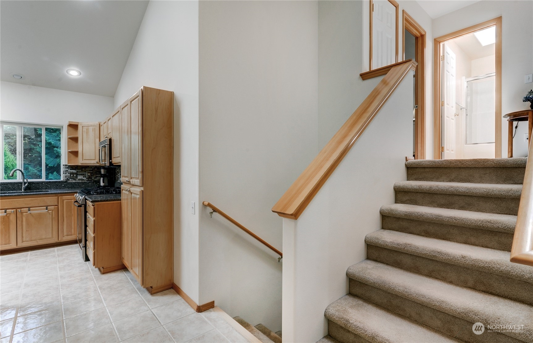 5303 Narbeck Avenue Everett, WA 98203 - Photo 15 of 40 a view of a kitchen with refrigerator and windows