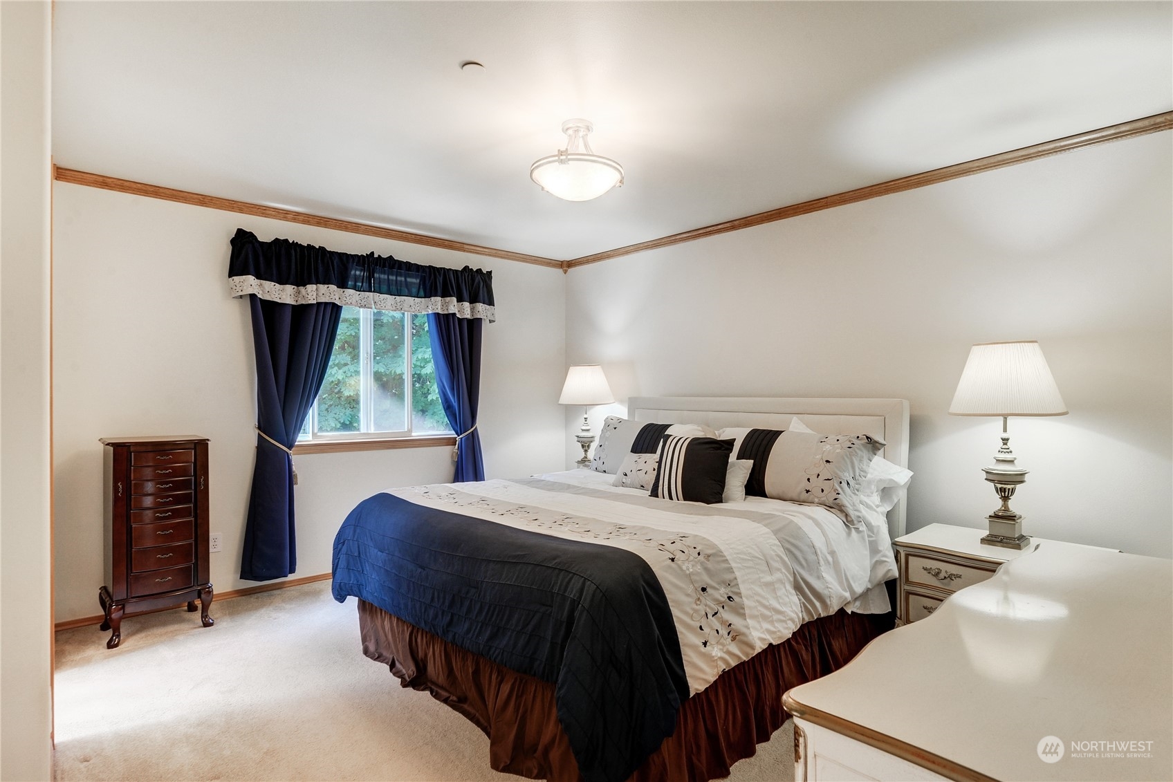 5303 Narbeck Avenue Everett, WA 98203 - Photo 17 of 40 a bedroom with bed and a window