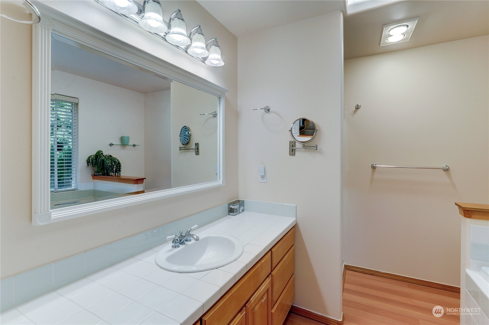 5303 Narbeck Avenue Everett, WA 98203 - Photo 20 of 40 a bathroom with a sink a vanity and a mirror