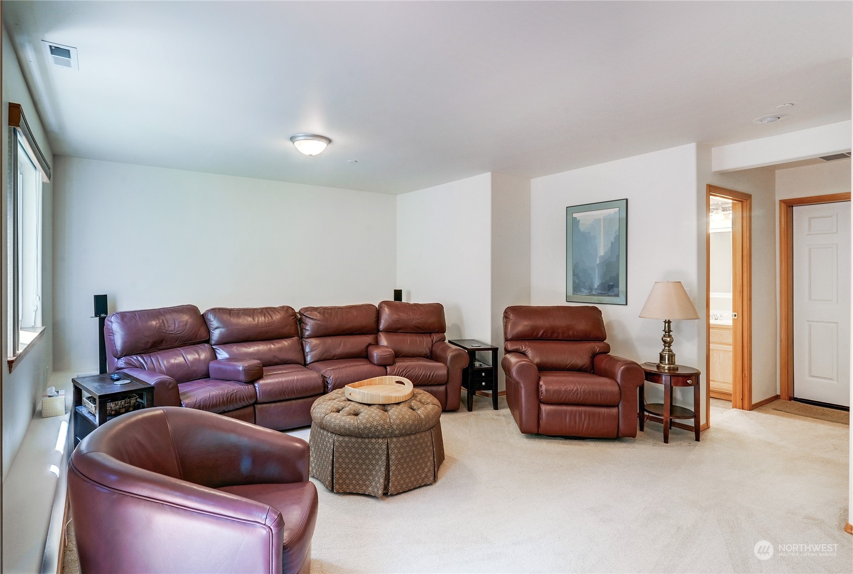 5303 Narbeck Avenue Everett, WA 98203 - Photo 27 of 40 a living room with furniture a ceiling fan and a window