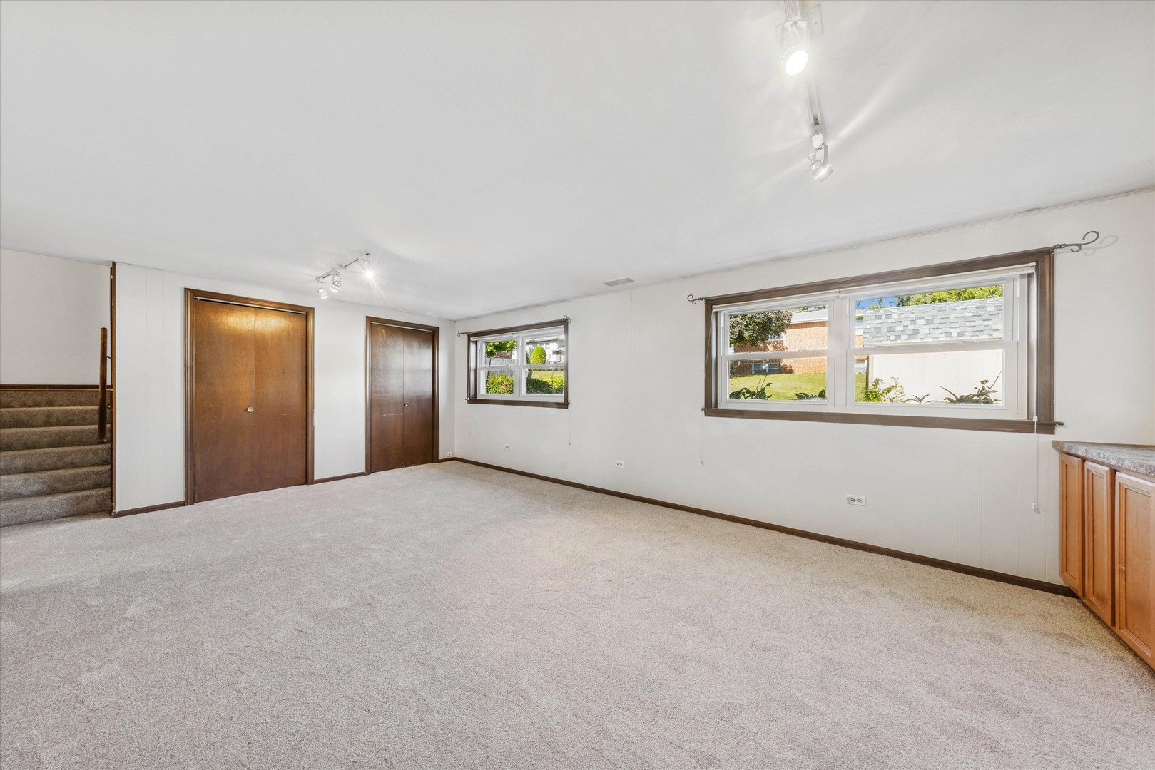 1310 Iroquois Lane Darien, IL 60561 - Photo 17 of 22 an empty room with windows