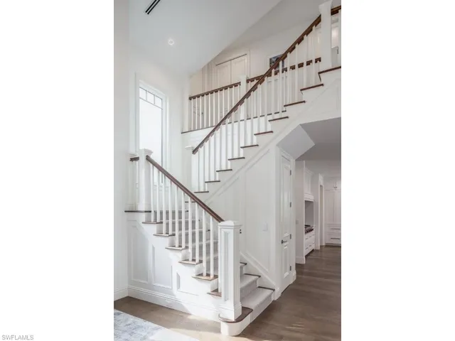 a view of entryway with wooden floor