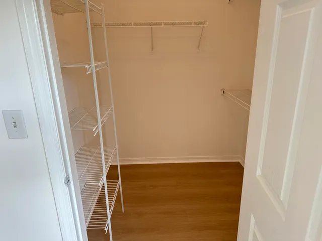 a view of storage and utility room with washer and dryer