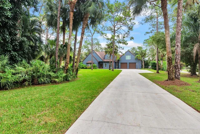 a view of backyard with green space