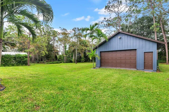a house with a tree in front of it