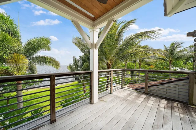 a view of deck with wooden floor and potted plant