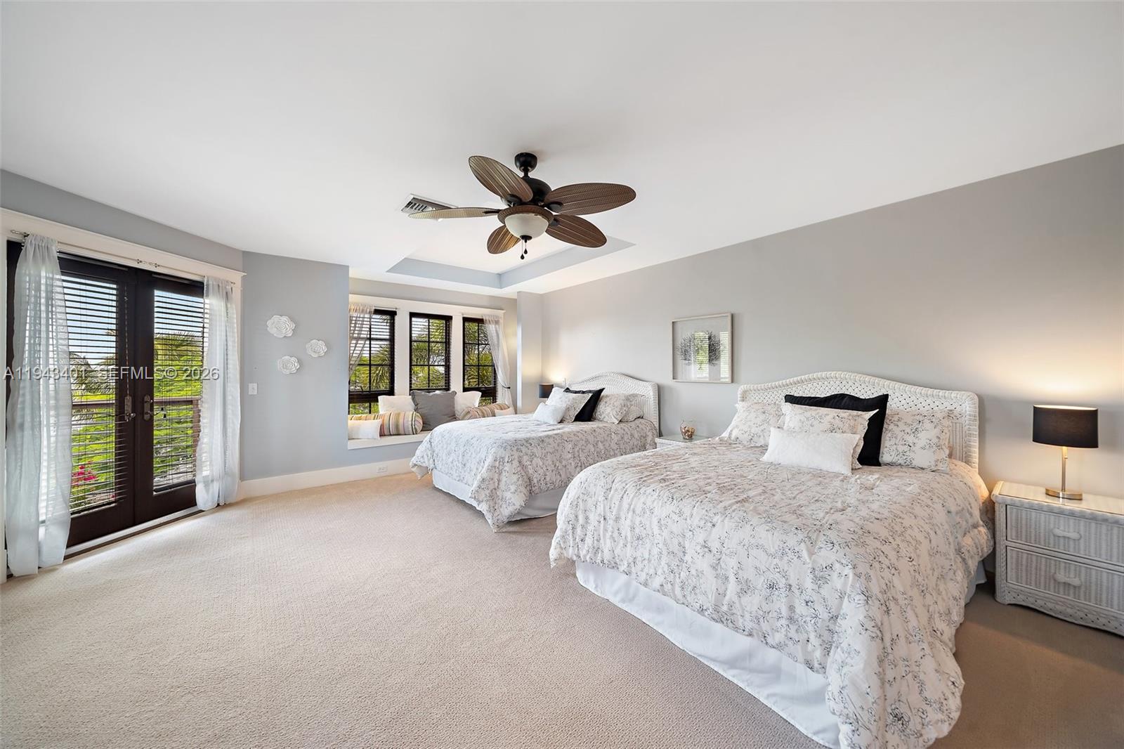 1890 Northwest River Trail Stuart, FL 34994 - Photo 27 of 52 a bed room with two bed and a large window