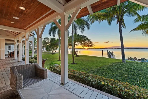 an outdoor space with furniture and garden