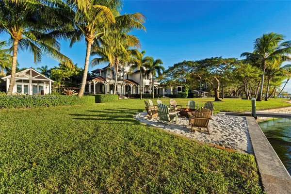 a view of a palm trees with a palm tree