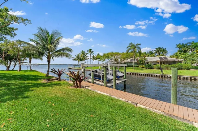 a view of a building with a yard