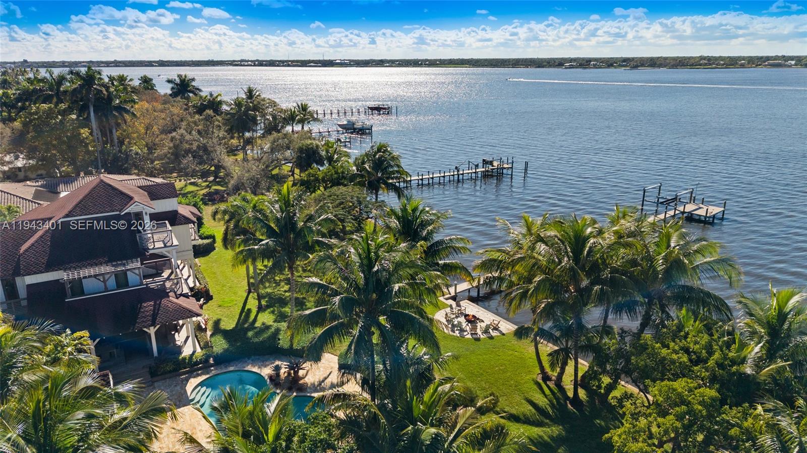 1890 Northwest River Trail Stuart, FL 34994 - Photo 9 of 52 a view of a lake with a building in the background