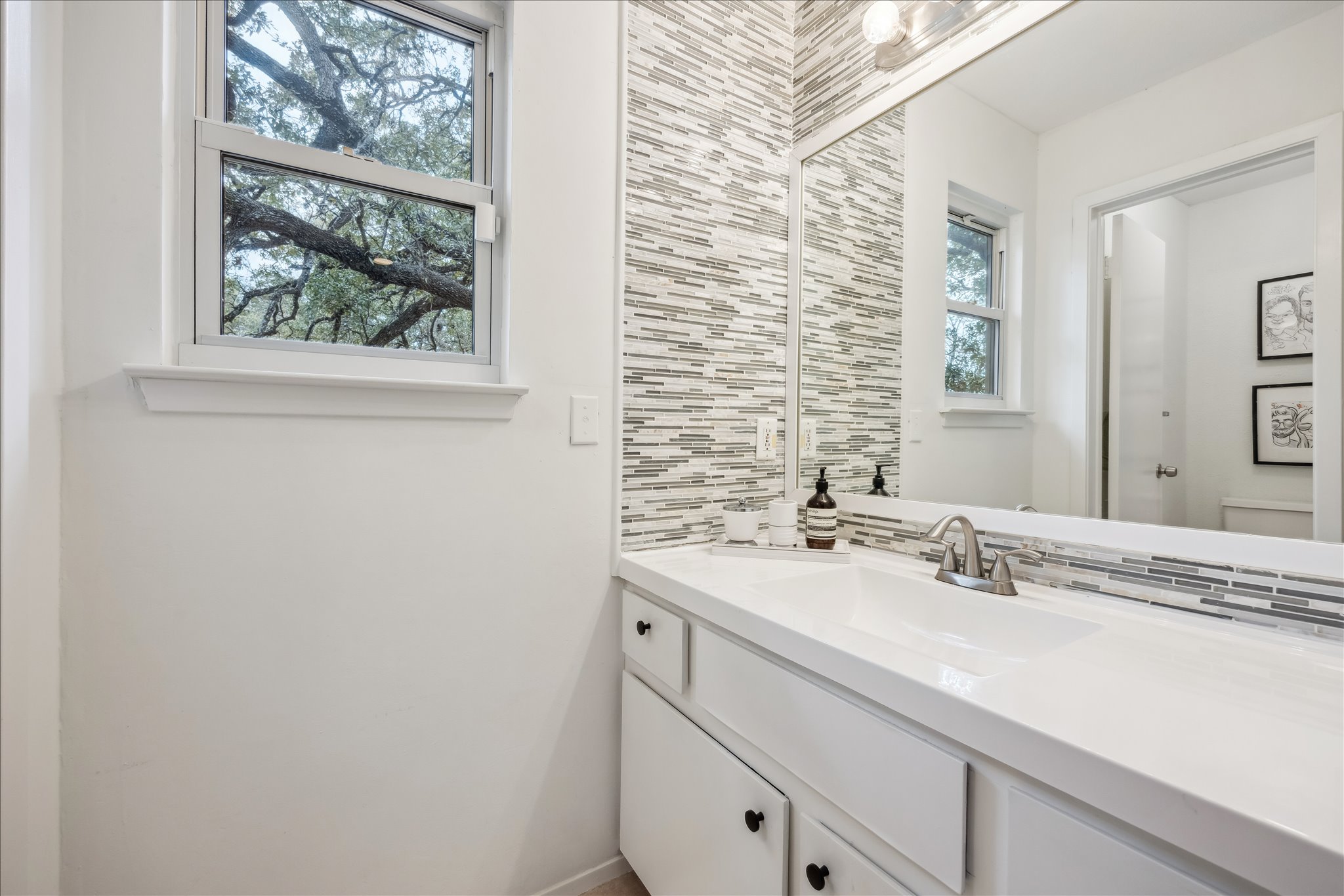 12935 Pegasus Street Austin, TX 78727 - Photo 31 of 38 The updated full second bathroom on the second floor