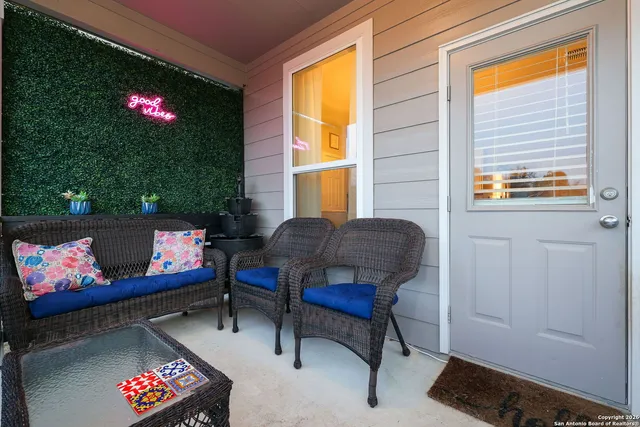 a living room with furniture and window