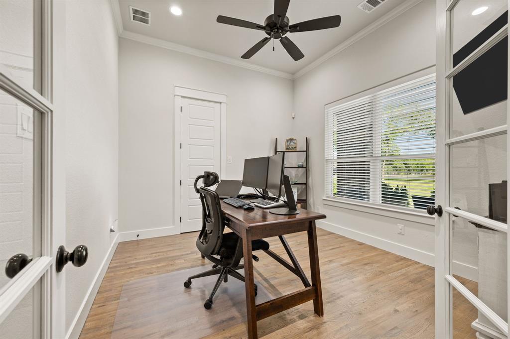 200 Clayton Crossing Springtown, TX 76082 - Photo 20 of 40 a view of a workspace with furniture and a window