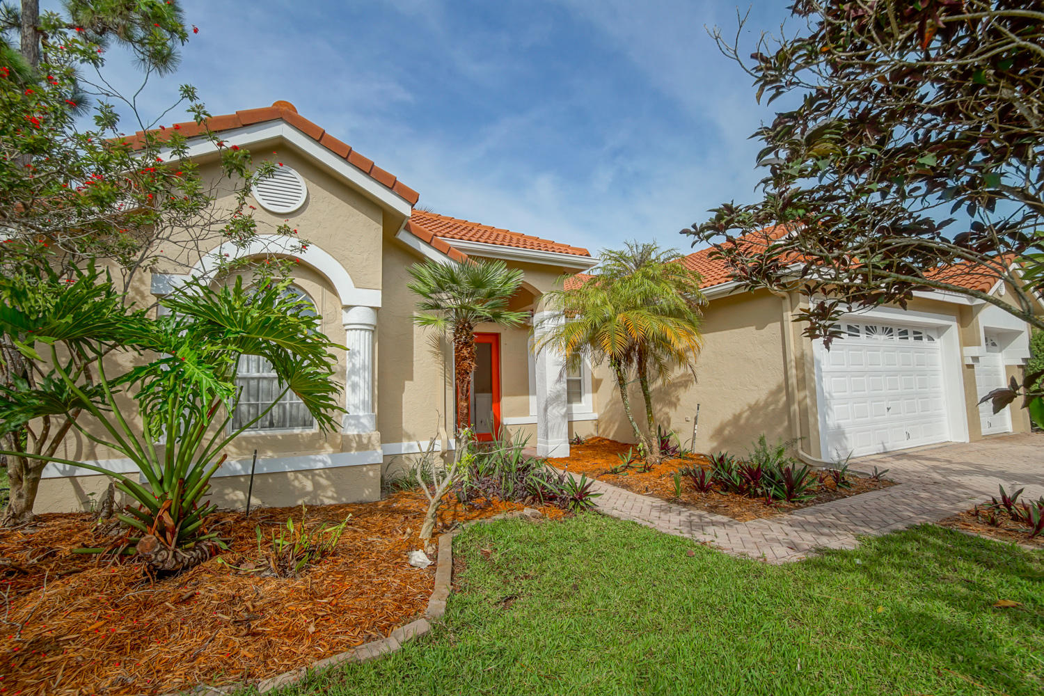 107 Nottingham Road Royal Palm Beach, FL 33411 - Photo 15 of 27 Lush landscaping