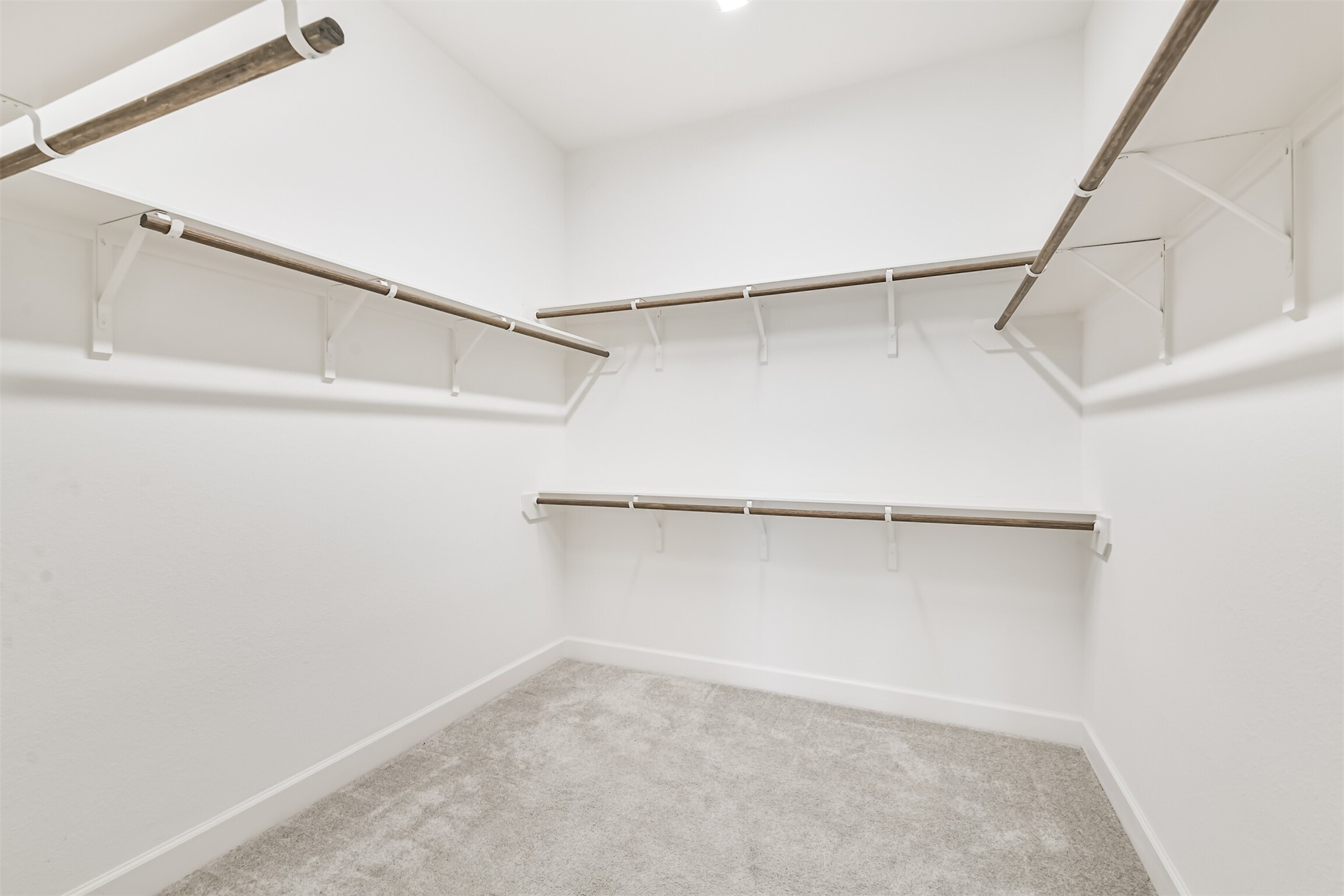 15611 Rising Wren Court Conroe, TX 77302 - Photo 31 of 38 a view of an empty walk in closet