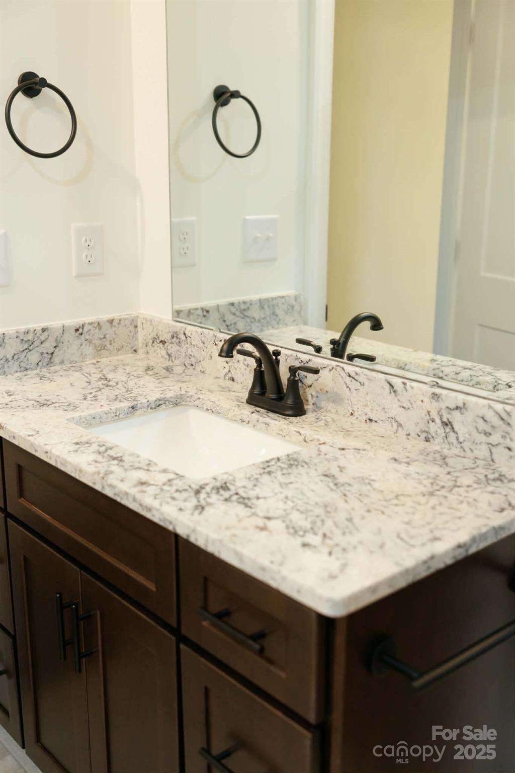 222 Guy Warlick Road Lawndale, NC 28090 - Photo 11 of 14 a bathroom with a sink and a mirror