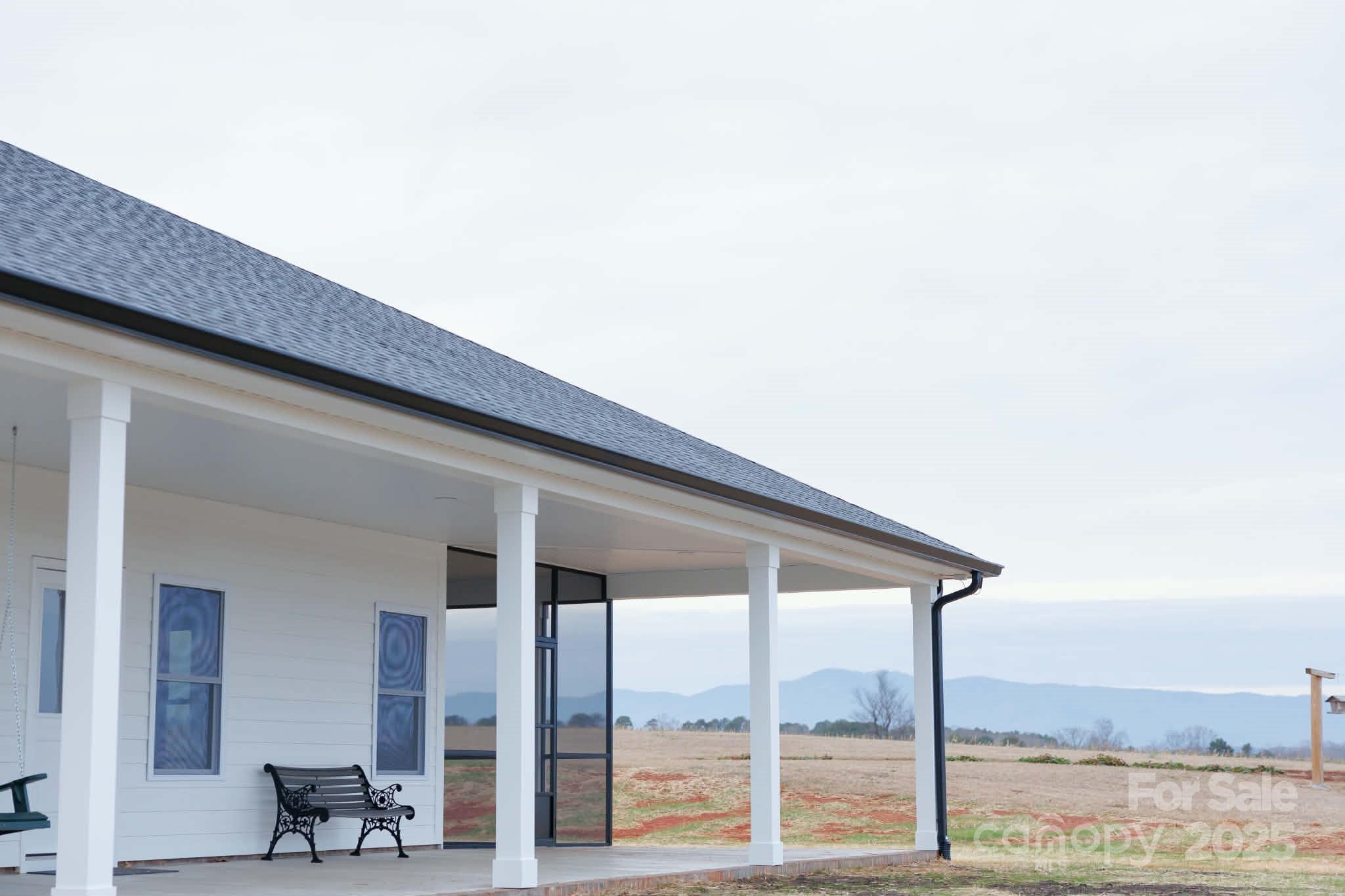 222 Guy Warlick Road Lawndale, NC 28090 - Photo 2 of 14 a roof deck with couch
