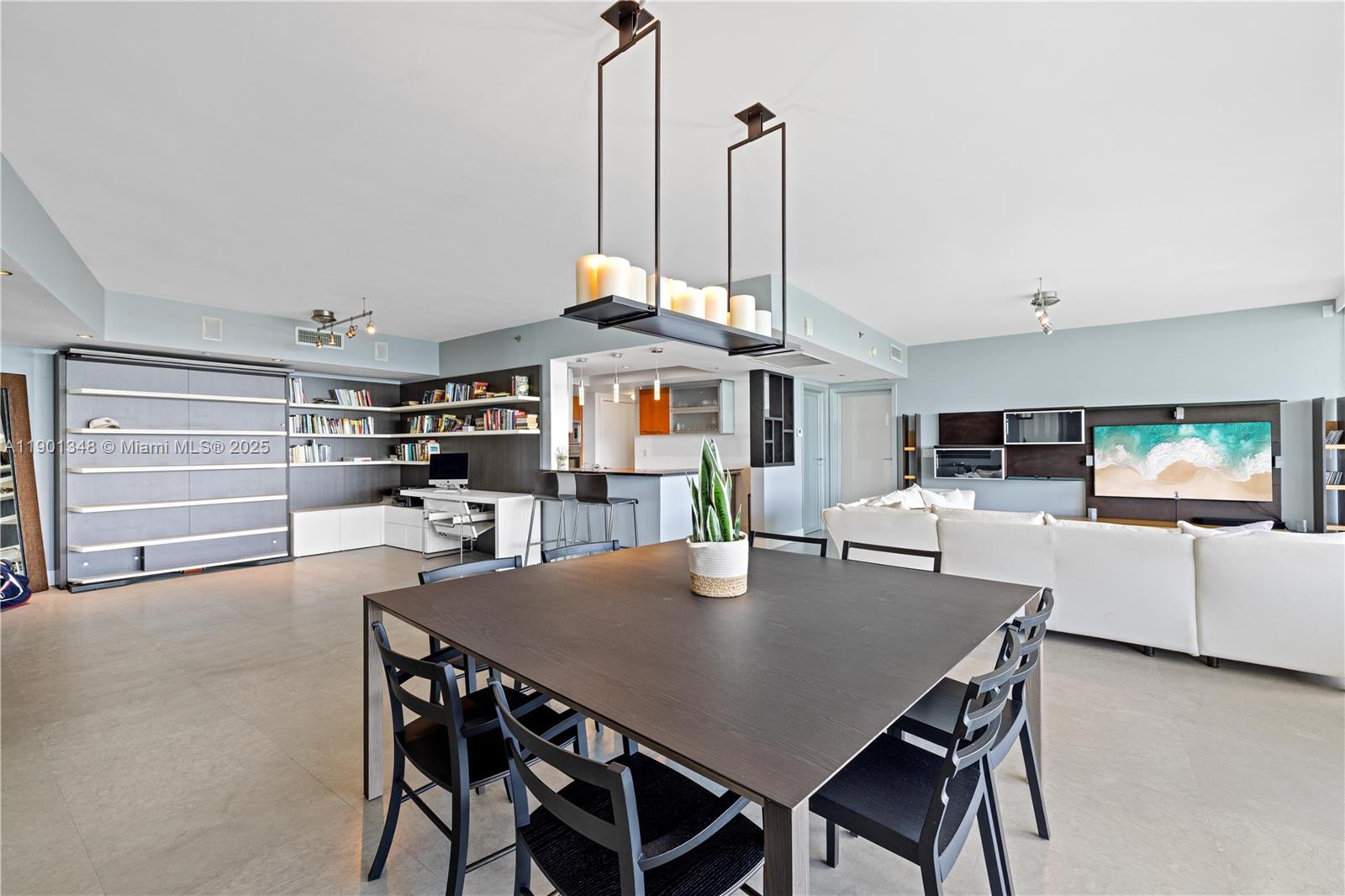 400 Alton Road, Unit 3006 Miami Beach, FL 33139 - Photo 9 of 28 a view of a dining room with furniture