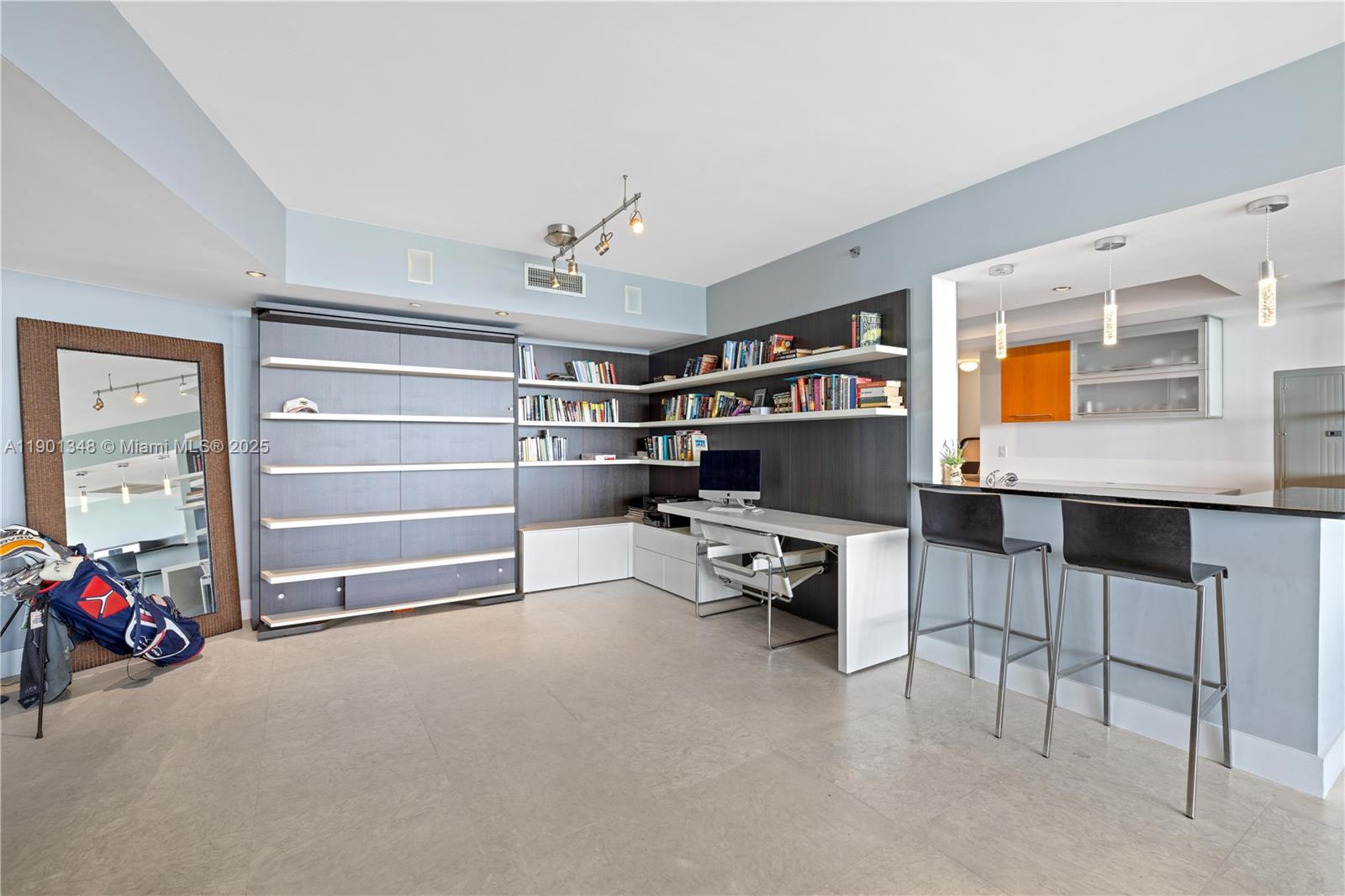 400 Alton Road, Unit 3006 Miami Beach, FL 33139 - Photo 10 of 28 a view of store room with cabinet and window