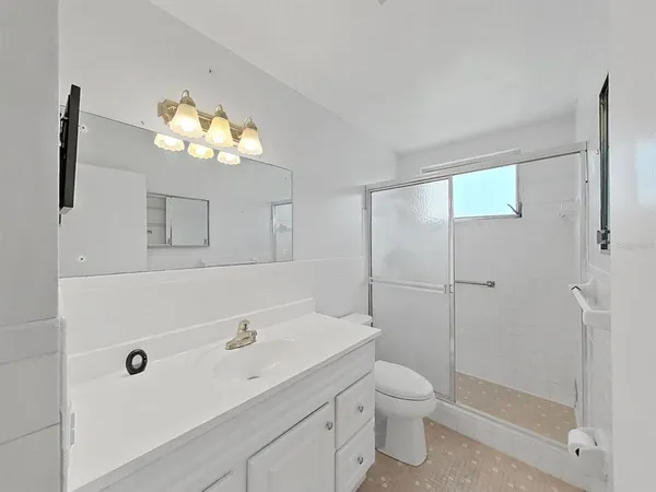 an empty room with a empty space and a window