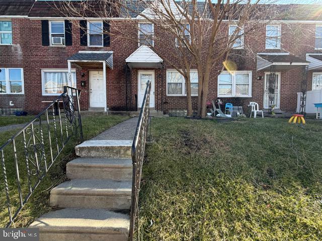 7221 Horrocks Street Philadelphia, PA 19149 - Photo 2 of 15 a front view of a house with a yard