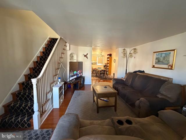 7221 Horrocks Street Philadelphia, PA 19149 - Photo 4 of 15 a living room with furniture and a fireplace