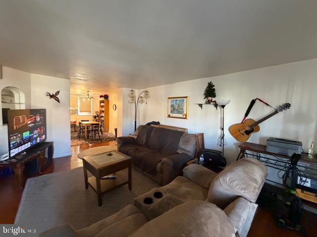 7221 Horrocks Street Philadelphia, PA 19149 - Photo 5 of 15 a living room with furniture and a flat screen tv