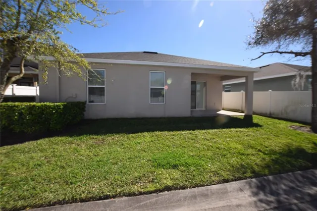 a house view with a garden space