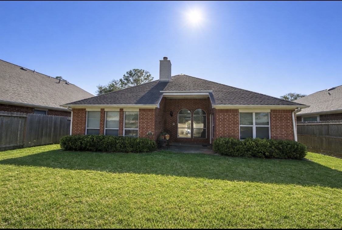 11227 Agave Ridge Lane Houston, TX 77089 - Photo 10 of 10 a front view of a house with garden
