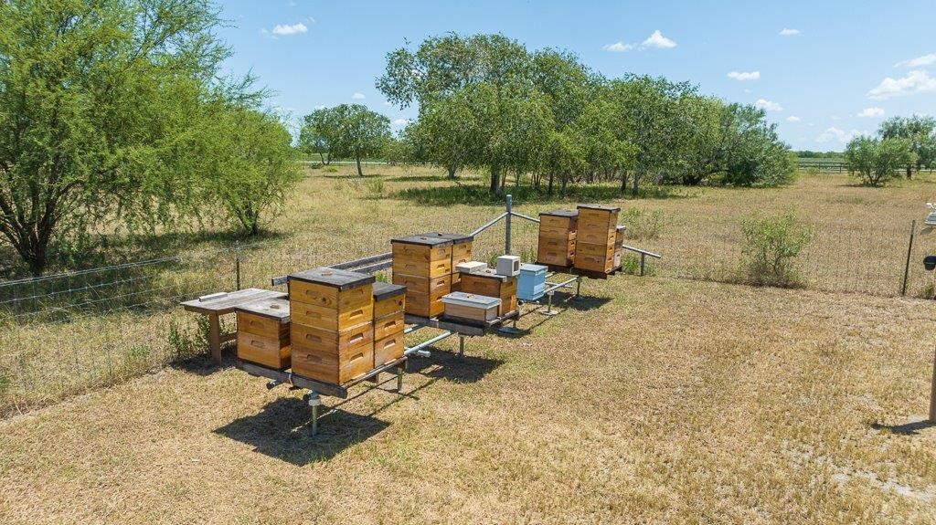 9223 County Road 2249 Sinton, TX 78387 - Photo 18 of 39 an outdoor sitting area with lake view