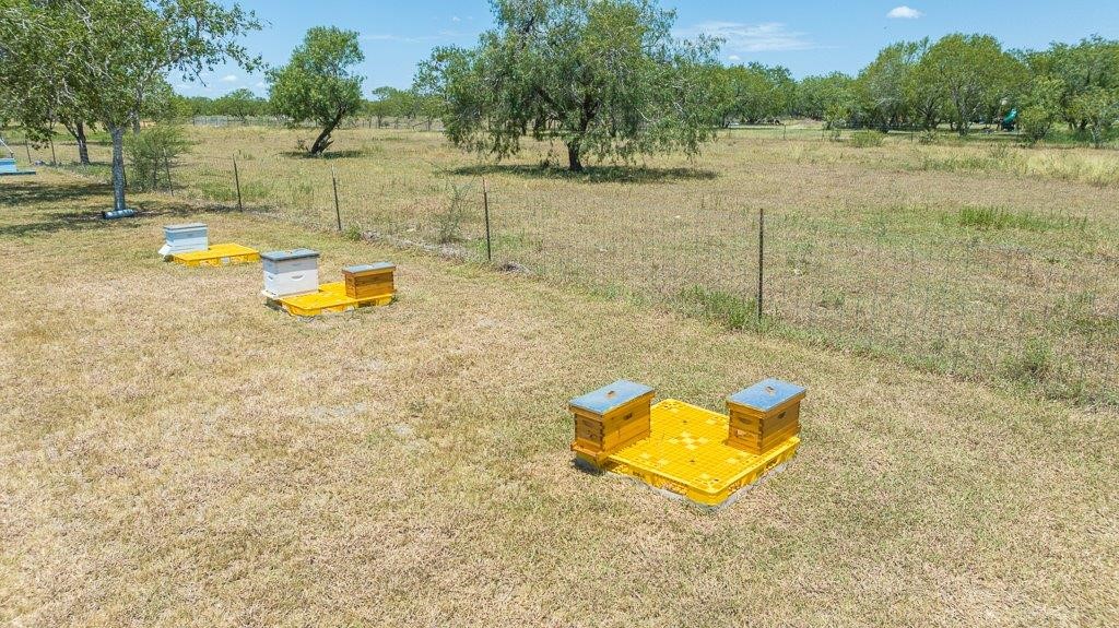 9223 County Road 2249 Sinton, TX 78387 - Photo 19 of 39 a view of a lake with a beach