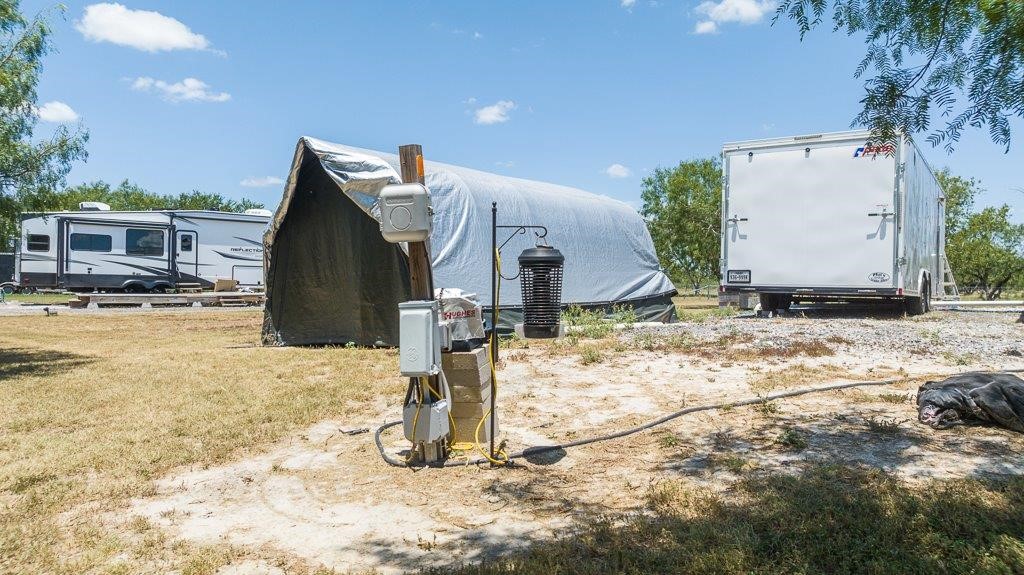 9223 County Road 2249 Sinton, TX 78387 - Photo 23 of 39 a front view of a house with a yard