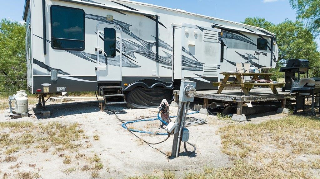 9223 County Road 2249 Sinton, TX 78387 - Photo 25 of 39 a view of outdoor space yard and porch