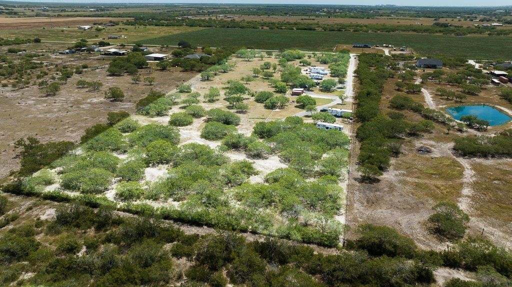 9223 County Road 2249 Sinton, TX 78387 - Photo 3 of 39 a view of an outdoor space and a lake view