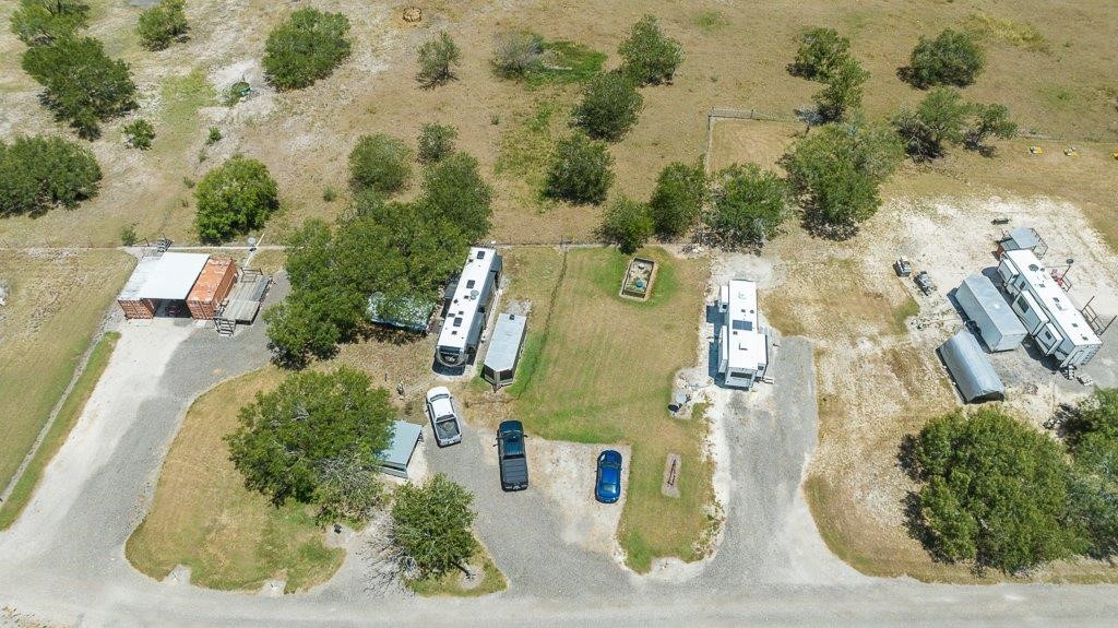 9223 County Road 2249 Sinton, TX 78387 - Photo 31 of 39 an aerial view of residential houses with outdoor space
