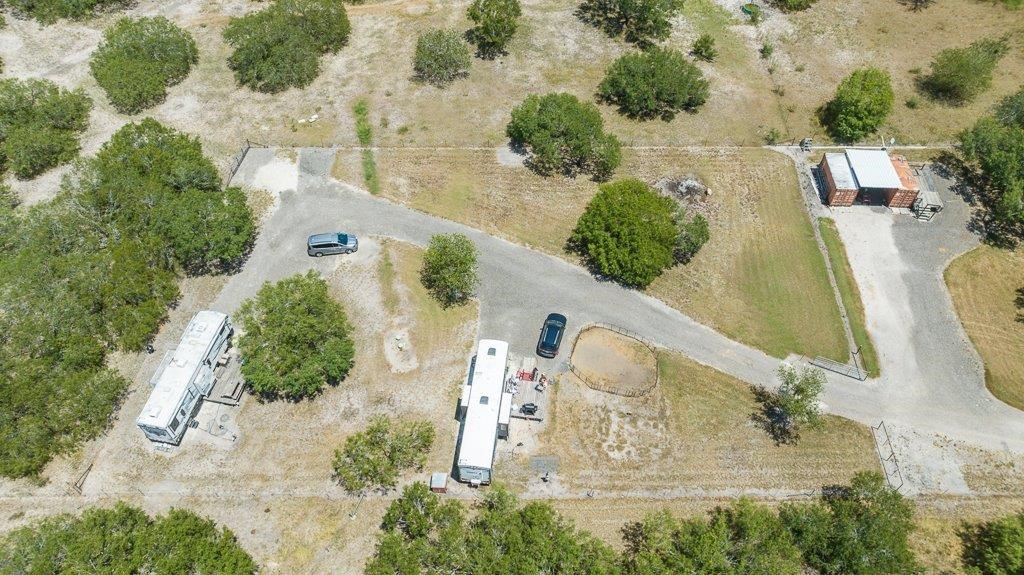 9223 County Road 2249 Sinton, TX 78387 - Photo 32 of 39 an aerial view of a house with a yard and ocean view