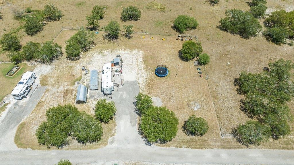 9223 County Road 2249 Sinton, TX 78387 - Photo 33 of 39 an aerial view of a house with a yard