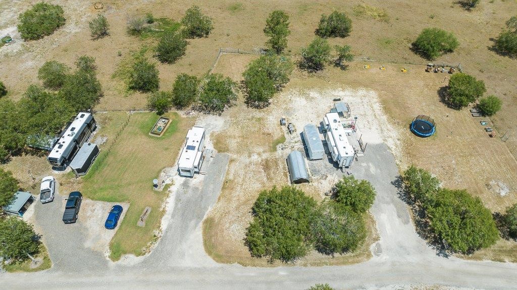 9223 County Road 2249 Sinton, TX 78387 - Photo 34 of 39 an aerial view of residential houses with outdoor space