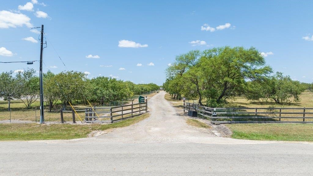 9223 County Road 2249 Sinton, TX 78387 - Photo 6 of 39 a view of a yard and entertaining space